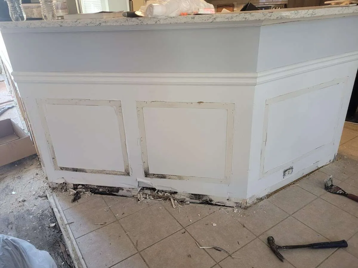 Water damage and mold on kitchen during Storm Damage Restoration in Bayou Cane